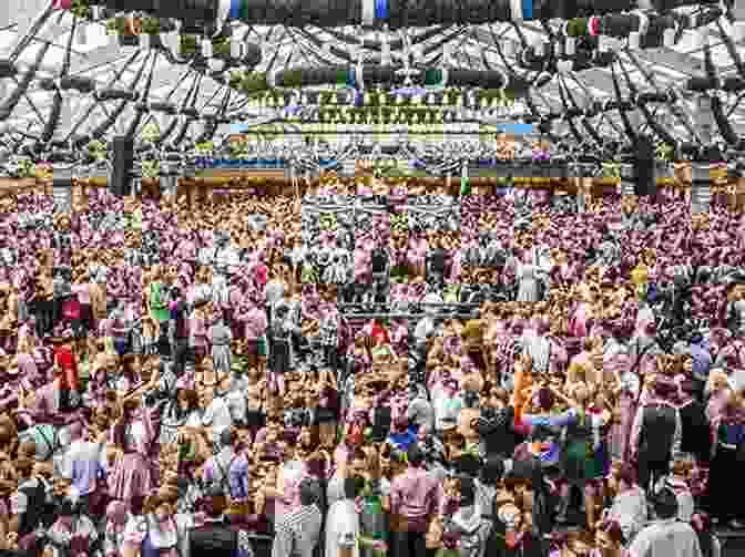 A Crowded Oktoberfest Tent With People Drinking Beer And Eating Traditional German Food. Florian Stollmayer S Quick Guide To The Oktoberfest In Munich Germany