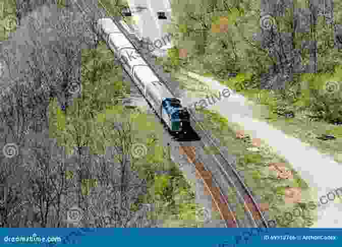 A Photograph Of A Modern Passenger Train Passing Through A Wooded Area In Maine. A History Of Maine Railroads (Transportation)