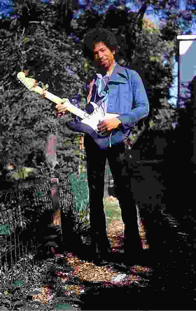 Young Jimi Hendrix Holding A Guitar, Seated On A Couch Jimi Hendrix Black Legacy: (A Dream Deferred)